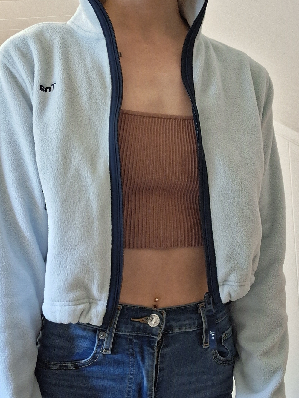 TNA Light Blue Fleece Jacket with Black Trim